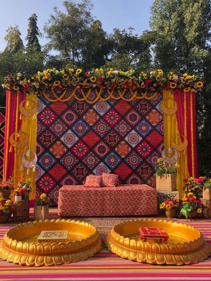 Wedding couple celebrating beneath elegant wedding décor by THE DEW CO.