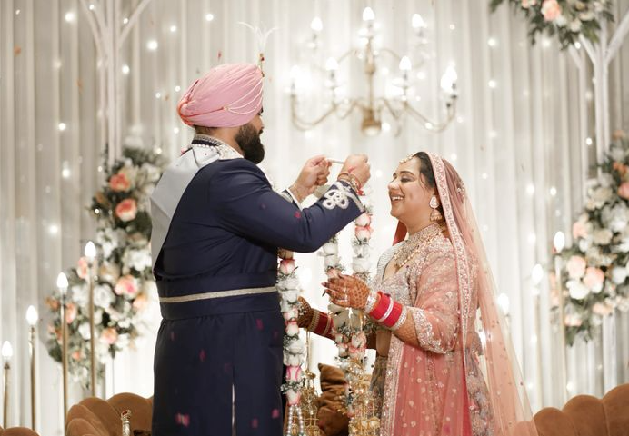 Wedding reception being prepared with coordinated décor and event details